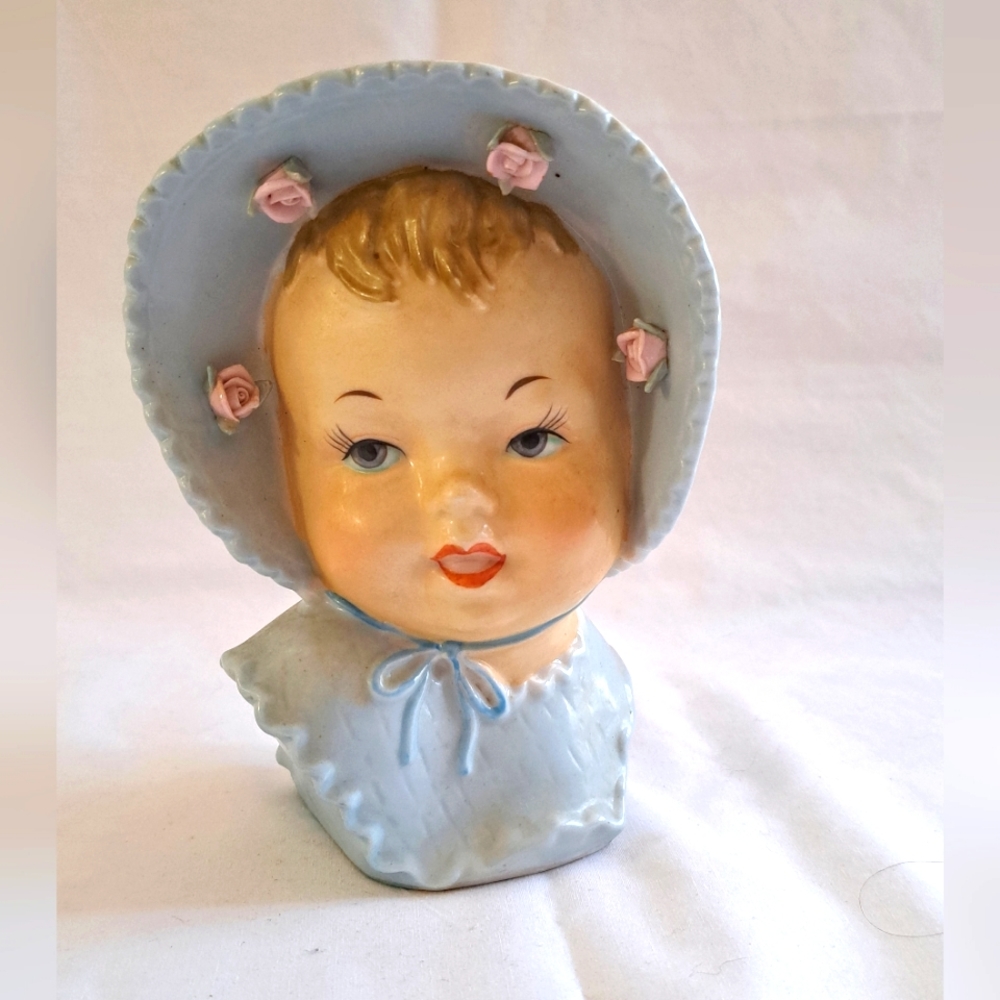 Blue Ucagco Baby Head Vase